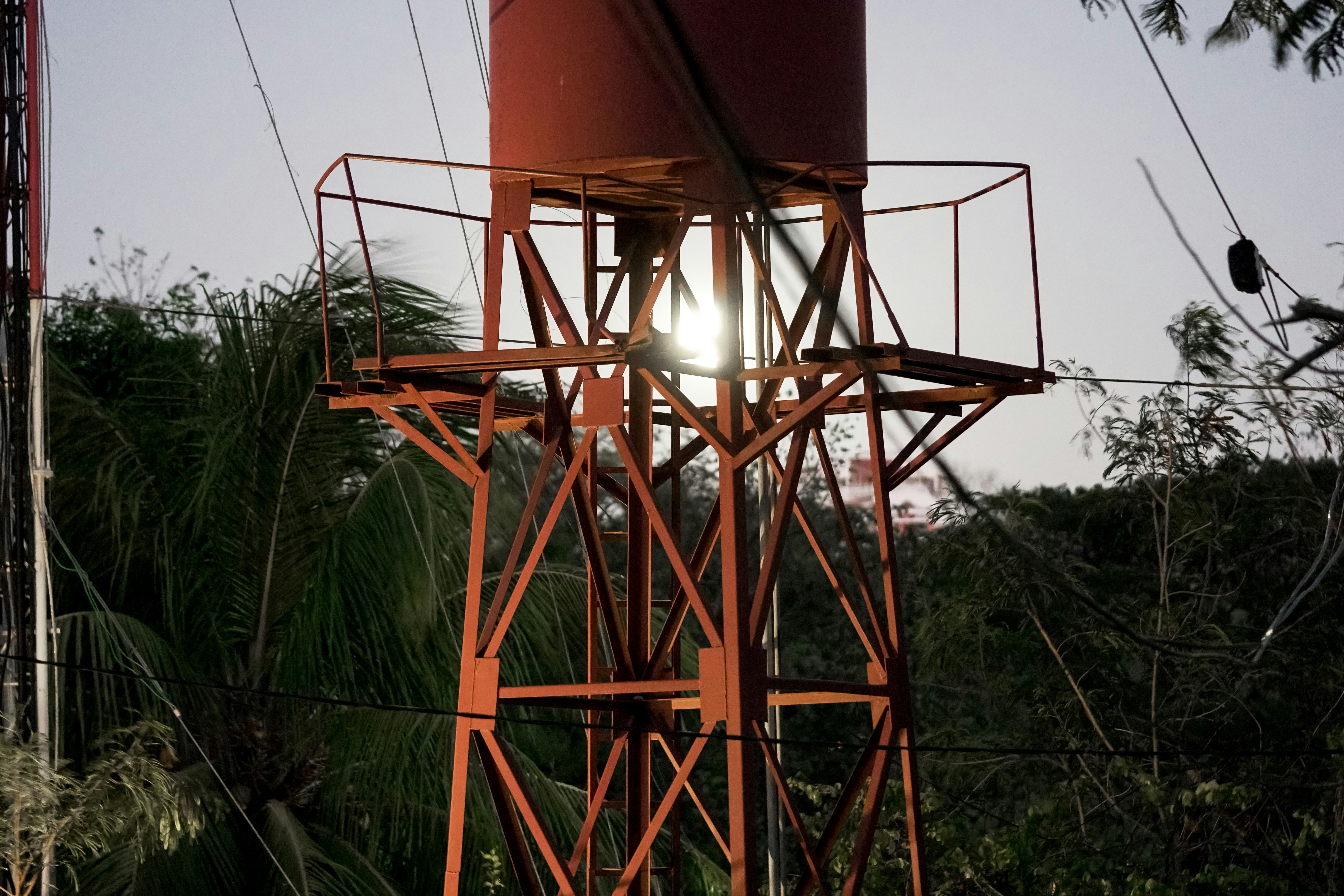 brown metal tower under blue sky during daytime